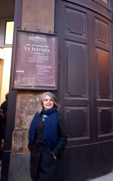 Fabiola Baquero by a theatre in Sicily
